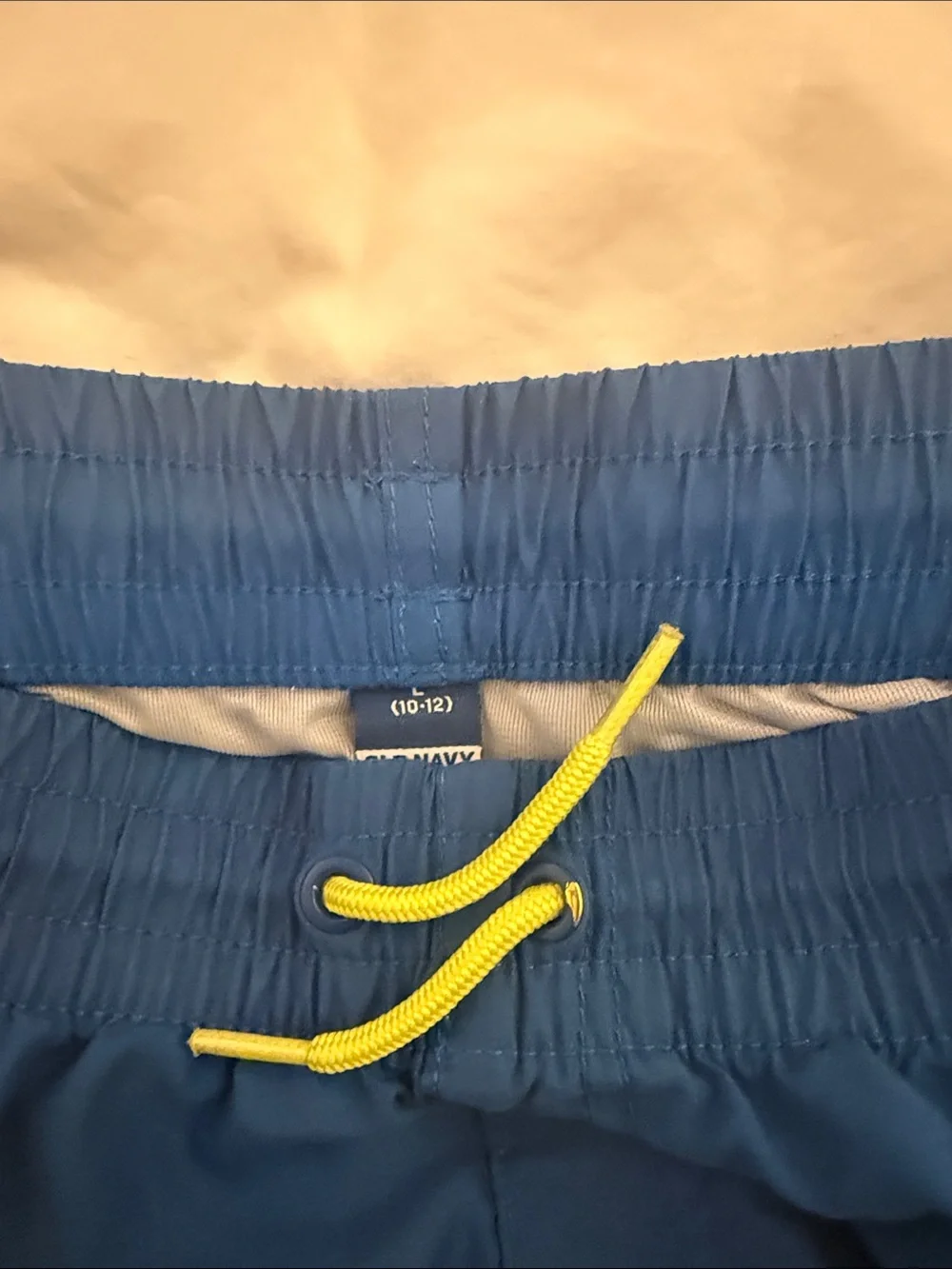 Old Navy Blue Kids Swim Trunks with Yellow Drawstring